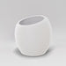 Spiral Globe Fiberglass Planter in matte bright white against gray background.