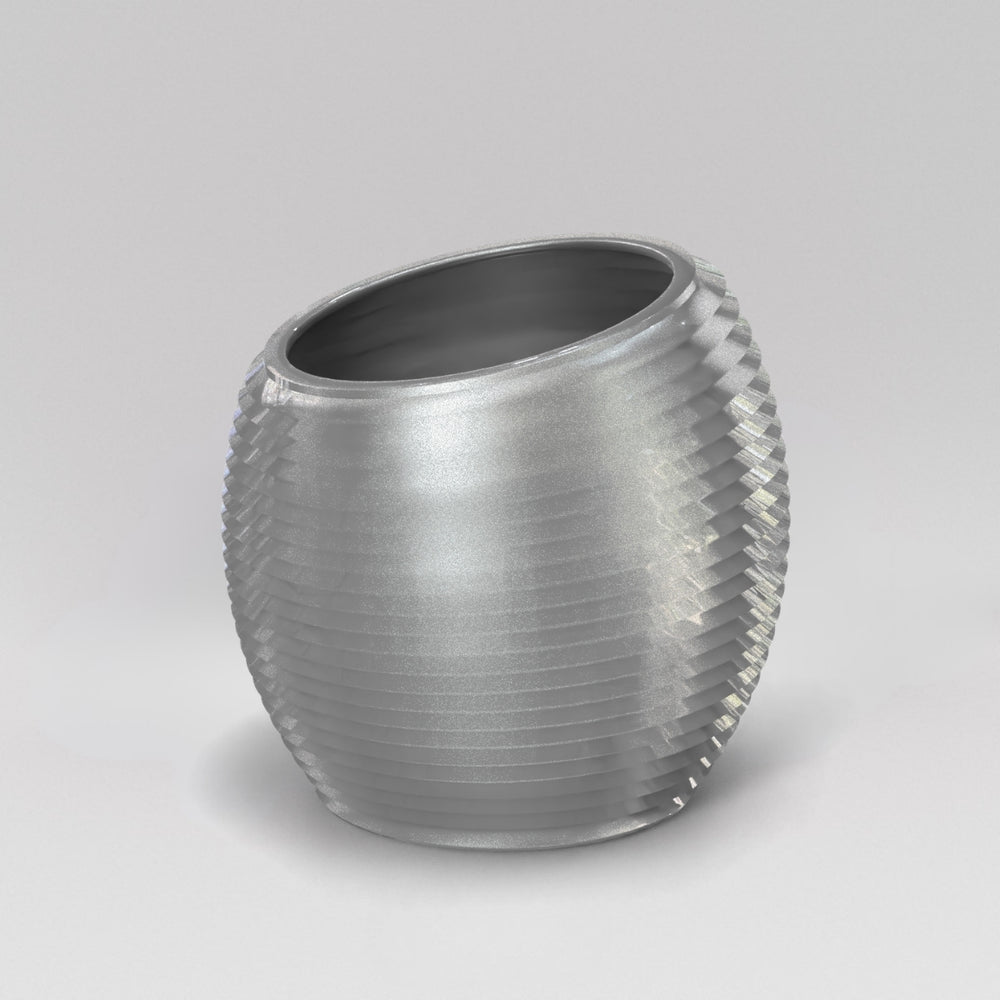 Spiral Globe Fiberglass Planter in metallic silver against gray background.
