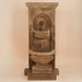 St. Helena Fountain with step against brown background.