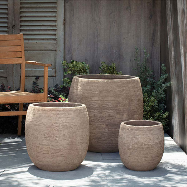 Tahoe Planter - Brown Terra Cotta - S/3 on concrete near wooden chair