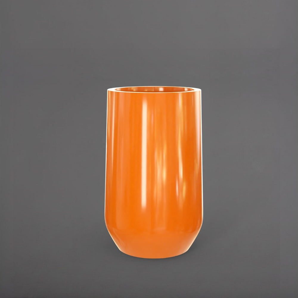 Tall Hayden Tapered Round Fiberglass Planter in gloss tangerine against gray background.