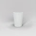 Tagel Tapered Round Fiberglass Planter in gloss bright white against gray background.