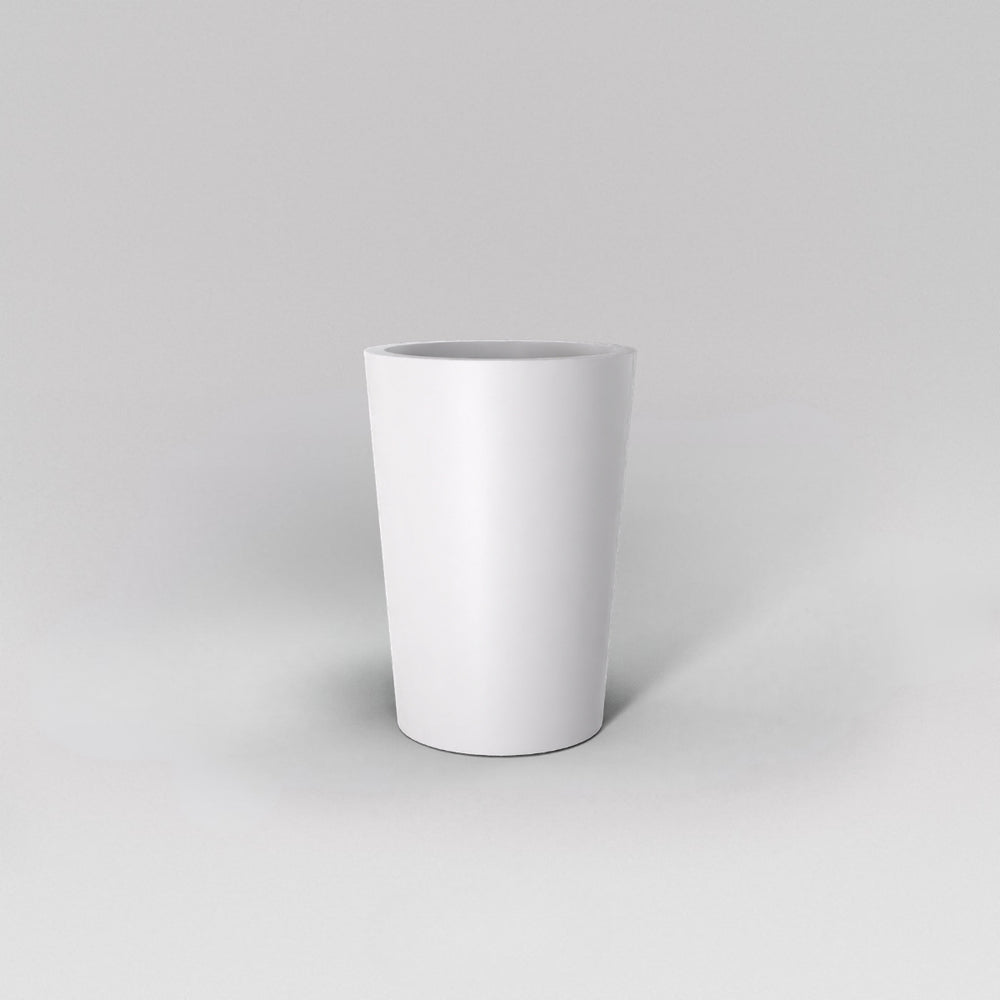 Tagel Tapered Round Fiberglass Planter in matte bright white against gray background.