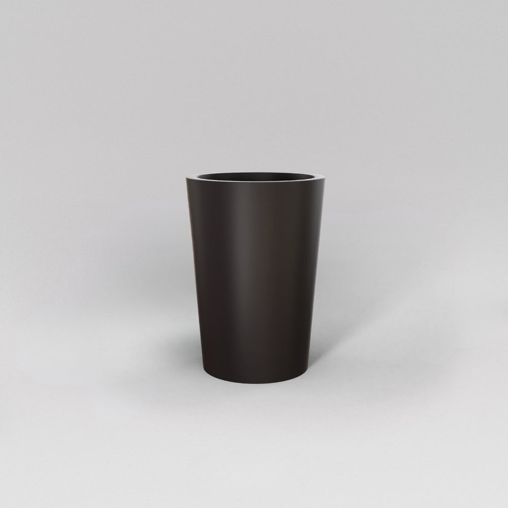 Tagel Tapered Round Fiberglass Planter in matte charcoal against gray background.