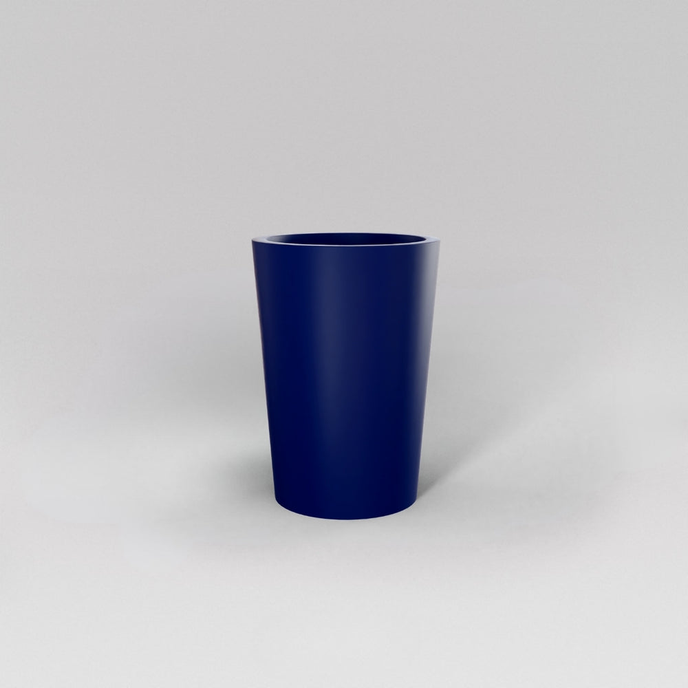 Tagel Tapered Round Fiberglass Planter in matte cobalt blue against gray background.