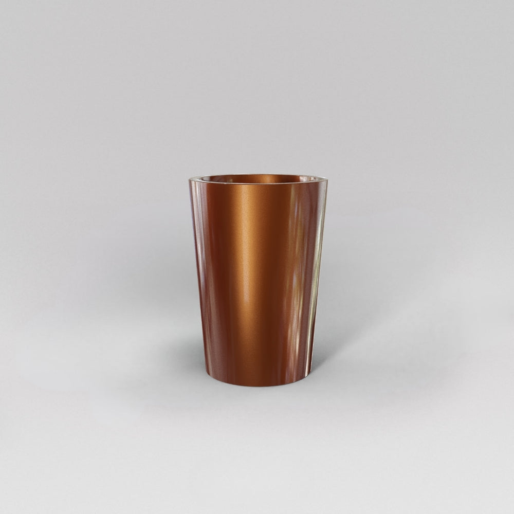Tagel Tapered Round Fiberglass Planter in metallic bronze against gray background.