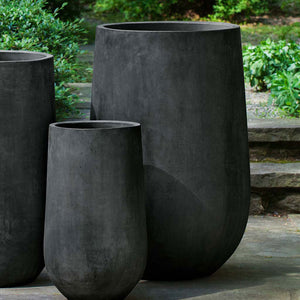 Telluride Planter, Tall in Charcoal in the backyard