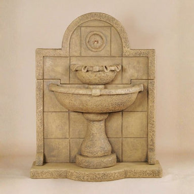 Terme Del Foro Wall Fountain against brown background.