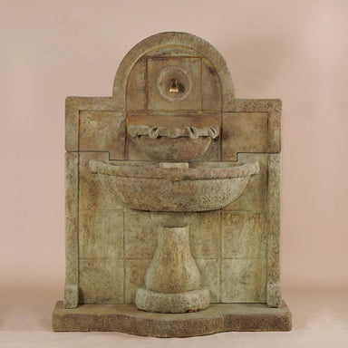 Terme del Foro Wall Fountain for Spout against brown background.