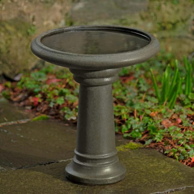 Terrace Birdbath in antique glazed on concrete in the backyard.