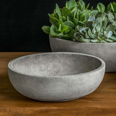 Terrace Bowl, Small on table beside planter filled with plants