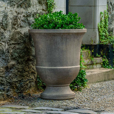 Textured Pascal Urn, Large on gravel filled with plants