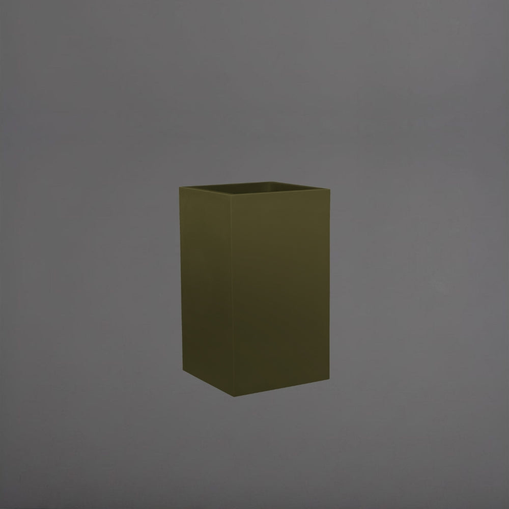 Tolga Corner Fiberglass Planter in matte bronze against gray background.