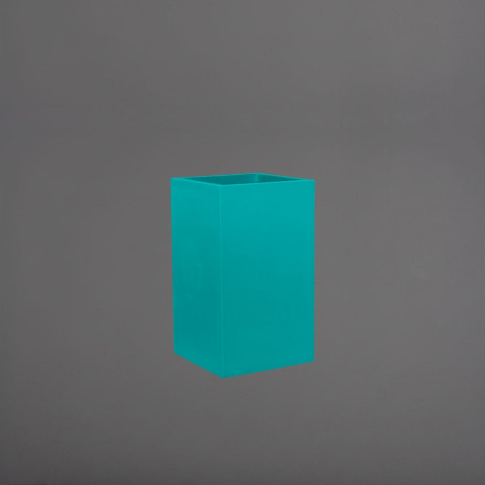  Tolga Corner Fiberglass Planter in satin seafoam green against gray background.