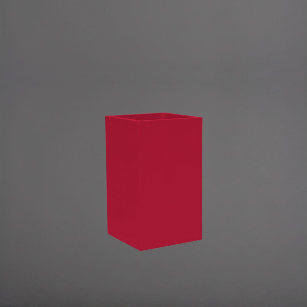 Torino Corner Fiberglass Planter in gloss red against gray background.