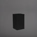 Torino Corner Fiberglass Planter in matte black against gray background.