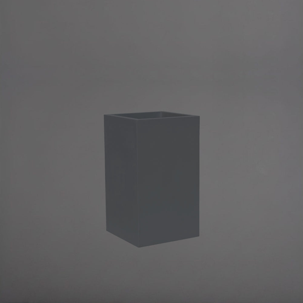 Torino Corner Fiberglass Planter in matte charcoal against gray background.