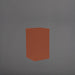 Torino Corner Fiberglass Planter in matte terra cotta against gray background.