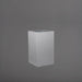 Torino Corner Fiberglass Planter in metallic silver against gray background.