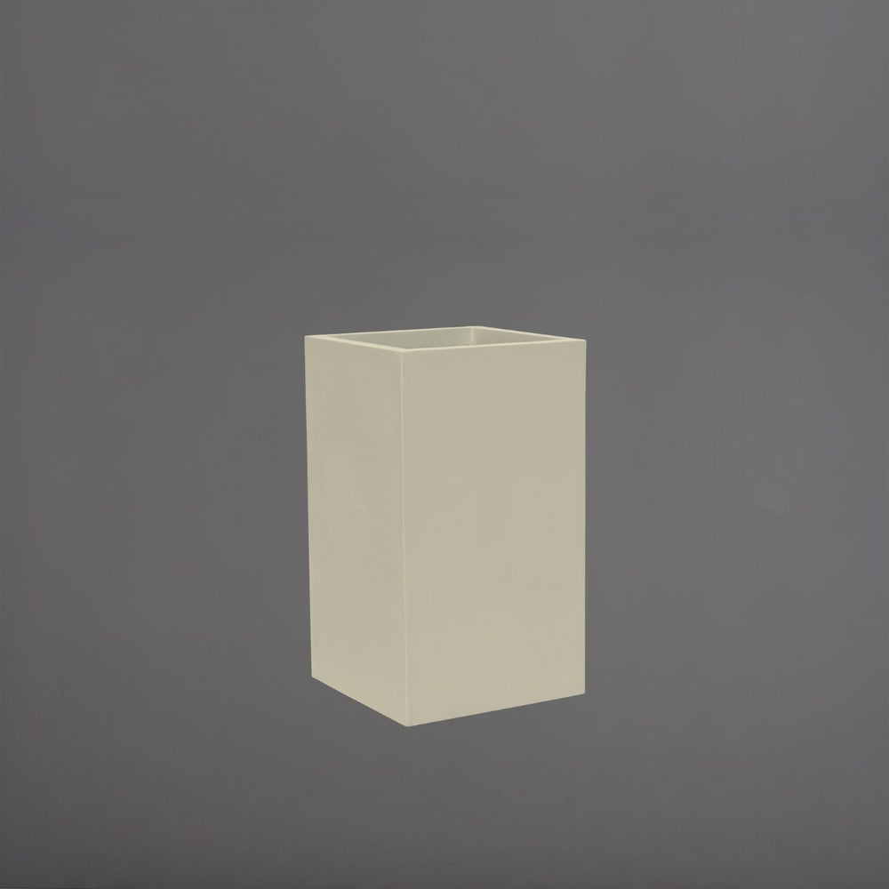 Torino Corner Fiberglass Planter in satin beige against gray background.