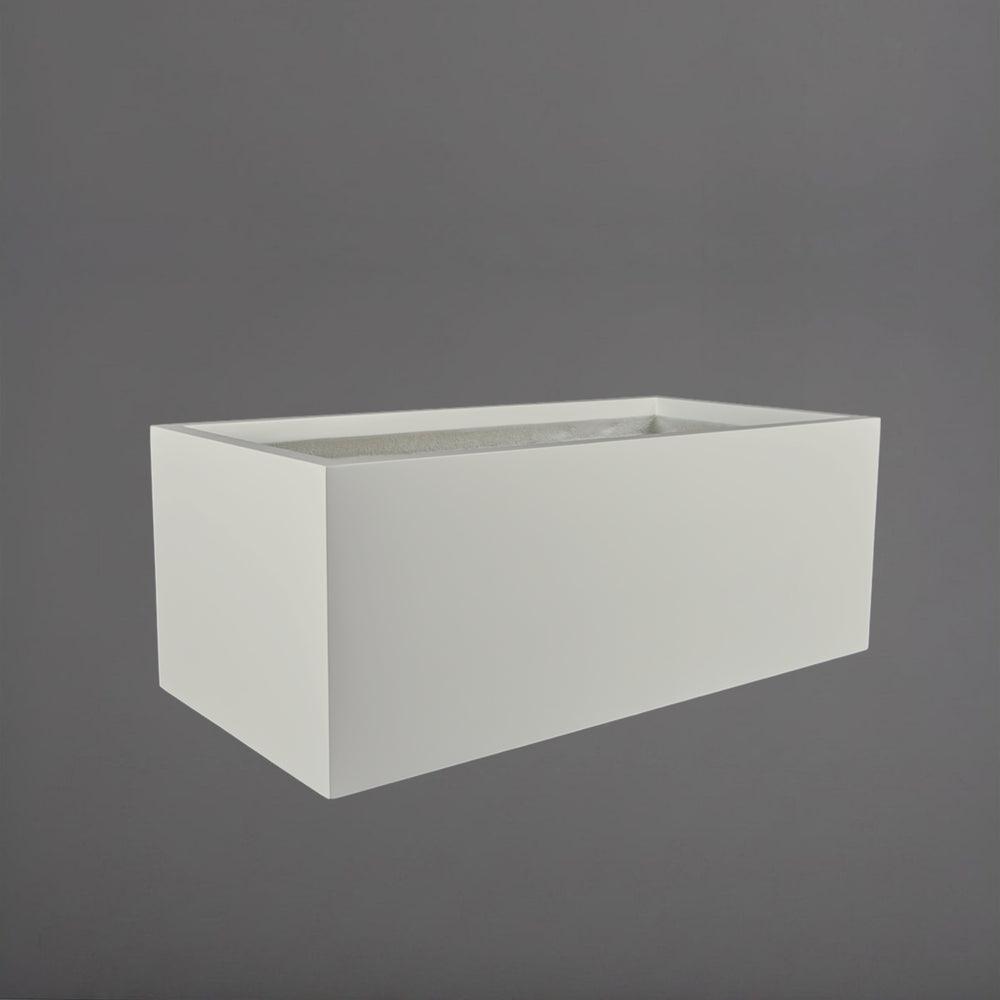 Torino Wide Rectangle Fiberglass Planter in matte cement grey against gray background.