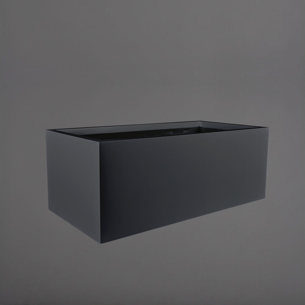 Torino Wide Rectangle Fiberglass Planter in matte charcoal against gray background.