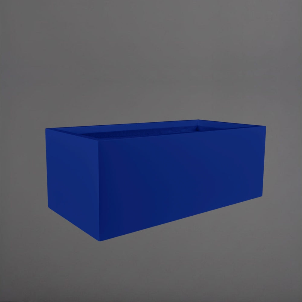 Torino Wide Rectangle Fiberglass Planter in matte cobalt blue against gray background.