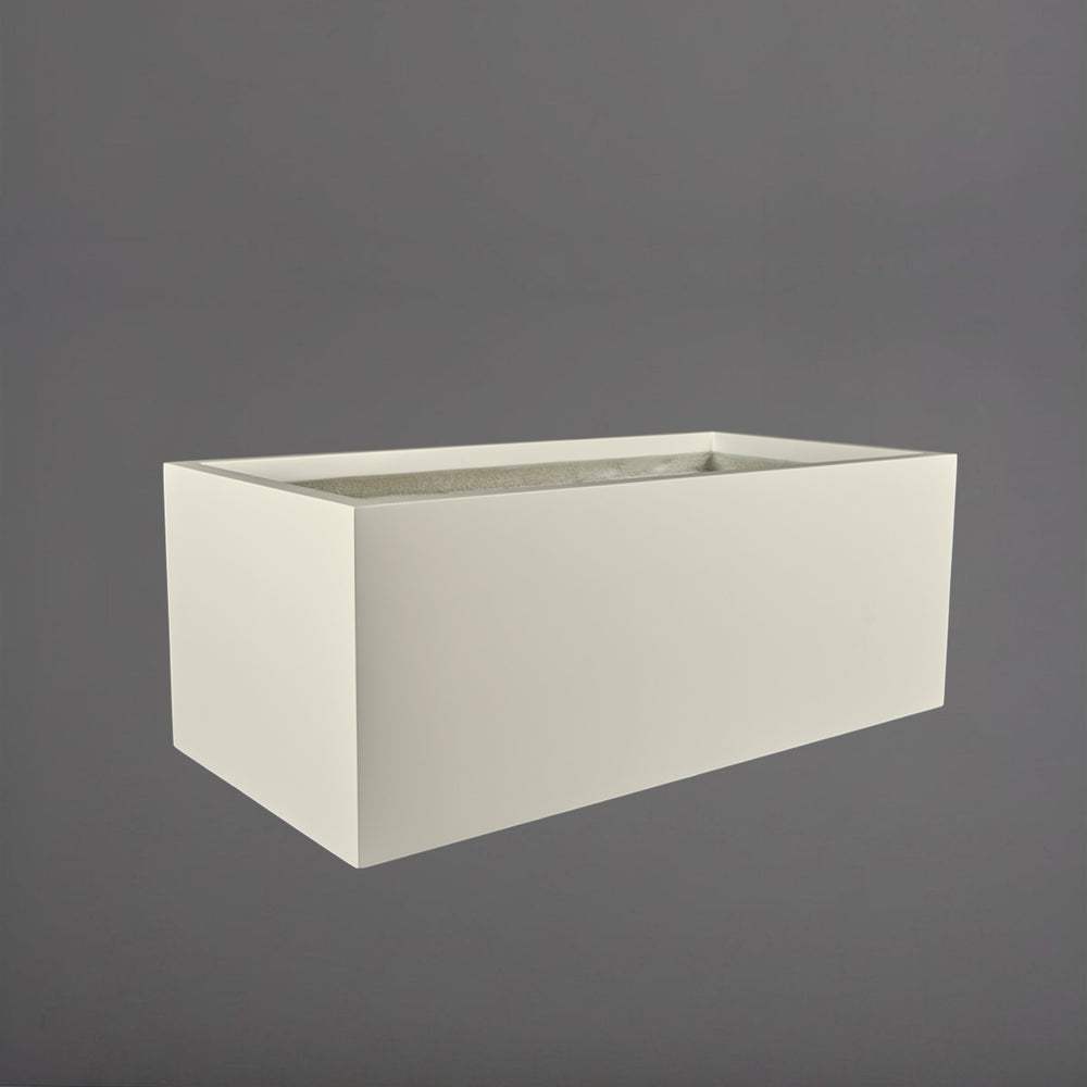 Torino Wide Rectangle Fiberglass Planter in satin beige against gray background.