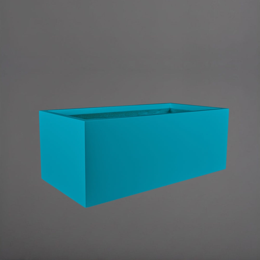 Torino Wide Rectangle Fiberglass Planter in satin seafoam green against gray background.
