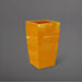 Toulan Tall Tapered Square Fiberglass Planter in gloss tangerine against gray background.