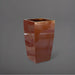Toulan Tall Tapered Square Fiberglass Planter in metallic bronze against gray background.