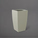 Toulan Tall Tapered Square Fiberglass Planter in satin beige against gray background.