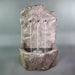 Tribus Rock Fountain  against gray background.