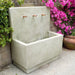 Tribus Wall Fountain in the backyard.