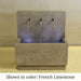 Tribus Wall Fountain in french limestone color in action.