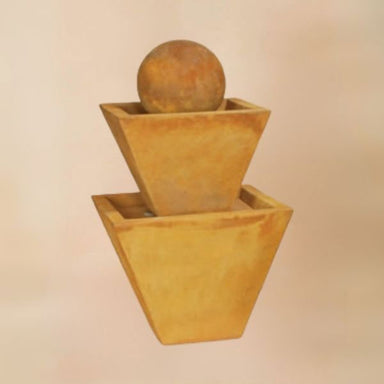 Two Tier Fountain, Medium against brown background.