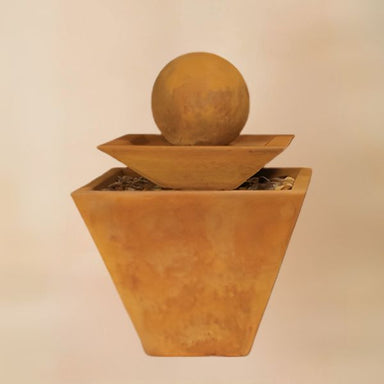 Two Tiered Tapered Square Fountain against brown background.