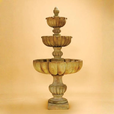 Urbino Grande Tall Three Tier Fountain against brown background.