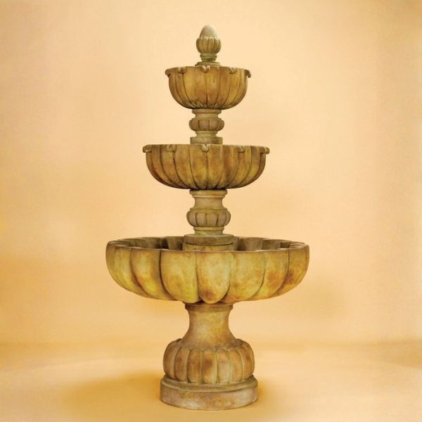 Urbino Grande Three Tier Fountain against brown background.