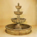 Urbino Grande Three Tier Pond Fountain against brown background.