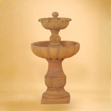 Urbino Tall Two Tier Fountain against brown background.