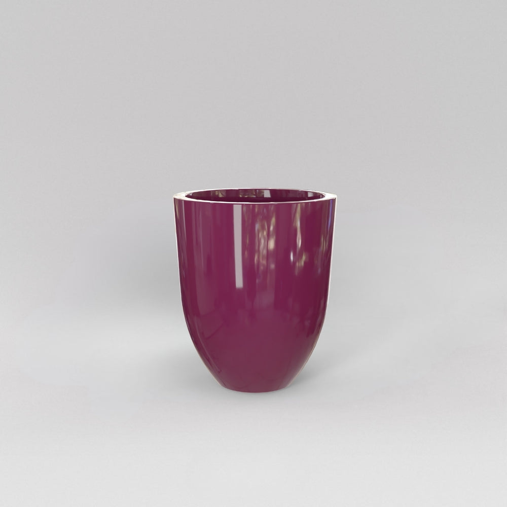 Valencia Tapered Round Fiberglass Planter in gloss eggplant against gray background.