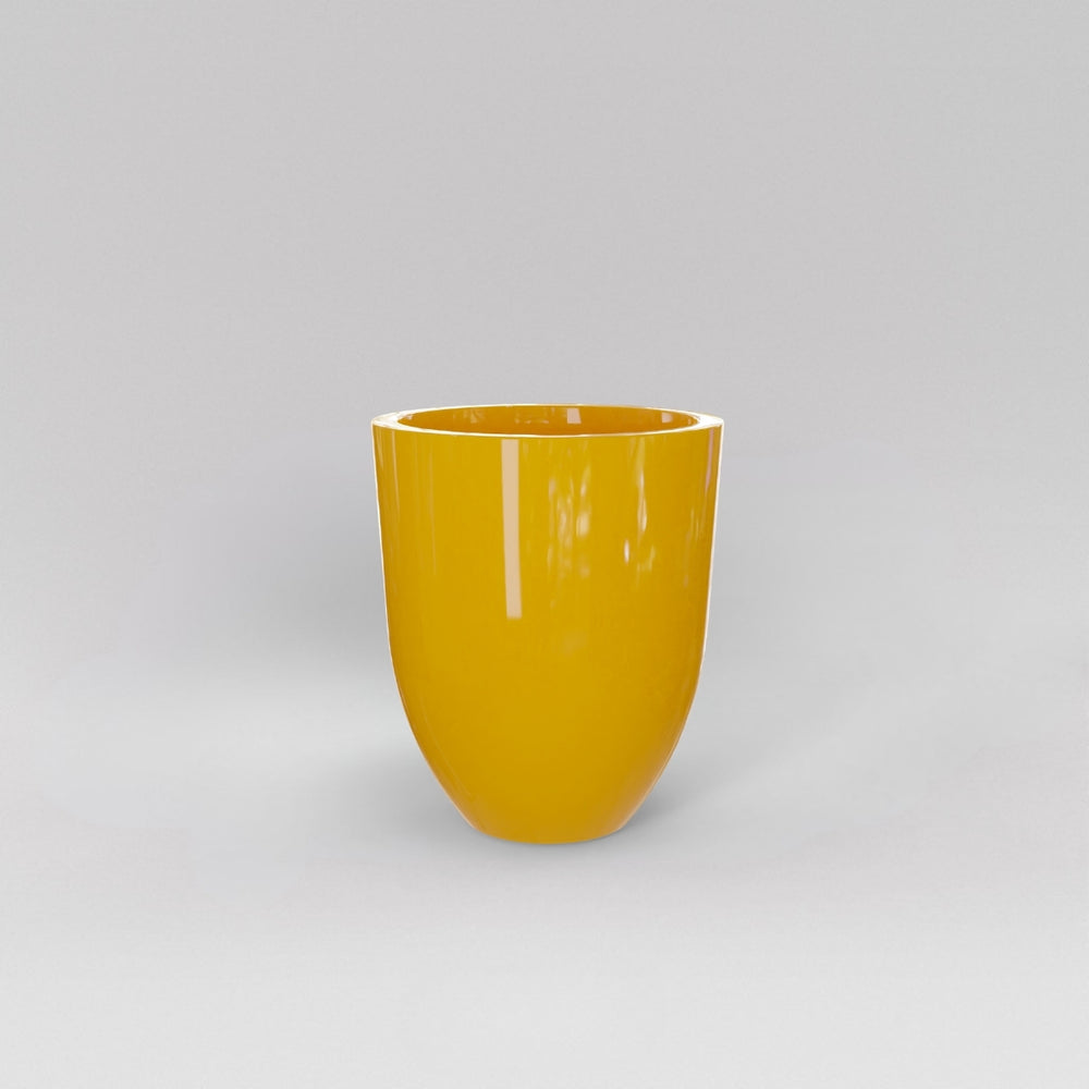 Valencia Tapered Round Fiberglass Planter in gloss saffron against gray background.