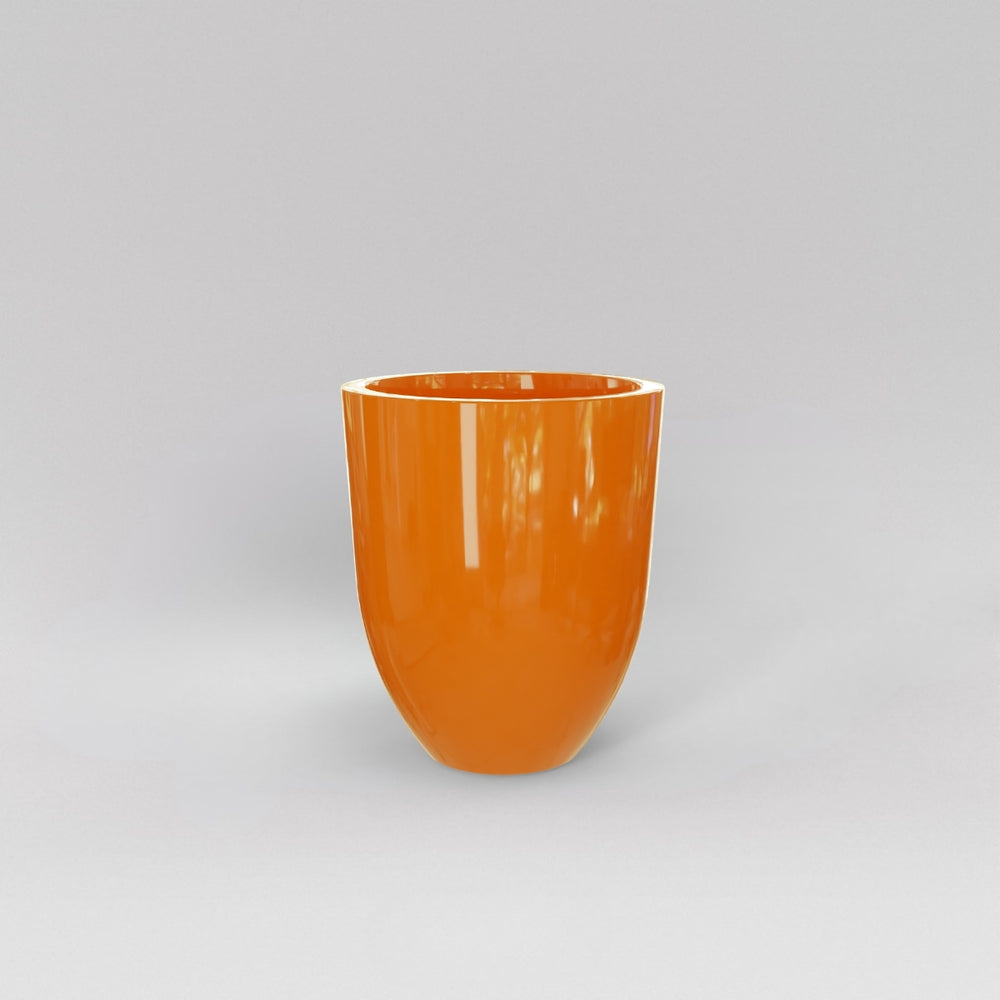 Valencia Tapered Round Fiberglass Planter in gloss tangerine against gray background.