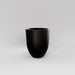 Valencia Tapered Round Fiberglass Planter in matte black against gray background.