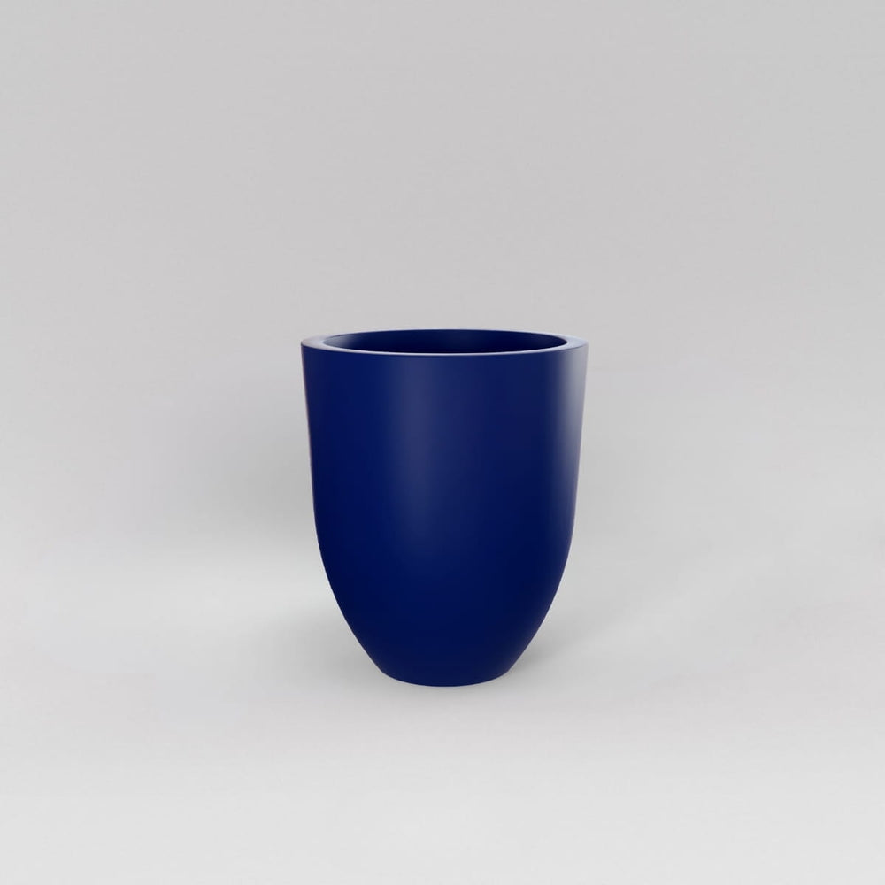Valencia Tapered Round Fiberglass Planter in matte cobalt blue against gray background.