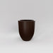 Valencia Tapered Round Fiberglass Planter in matte dark brown against gray background.