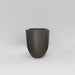 Valencia Tapered Round Fiberglass Planter in matte gunmetal against gray background.