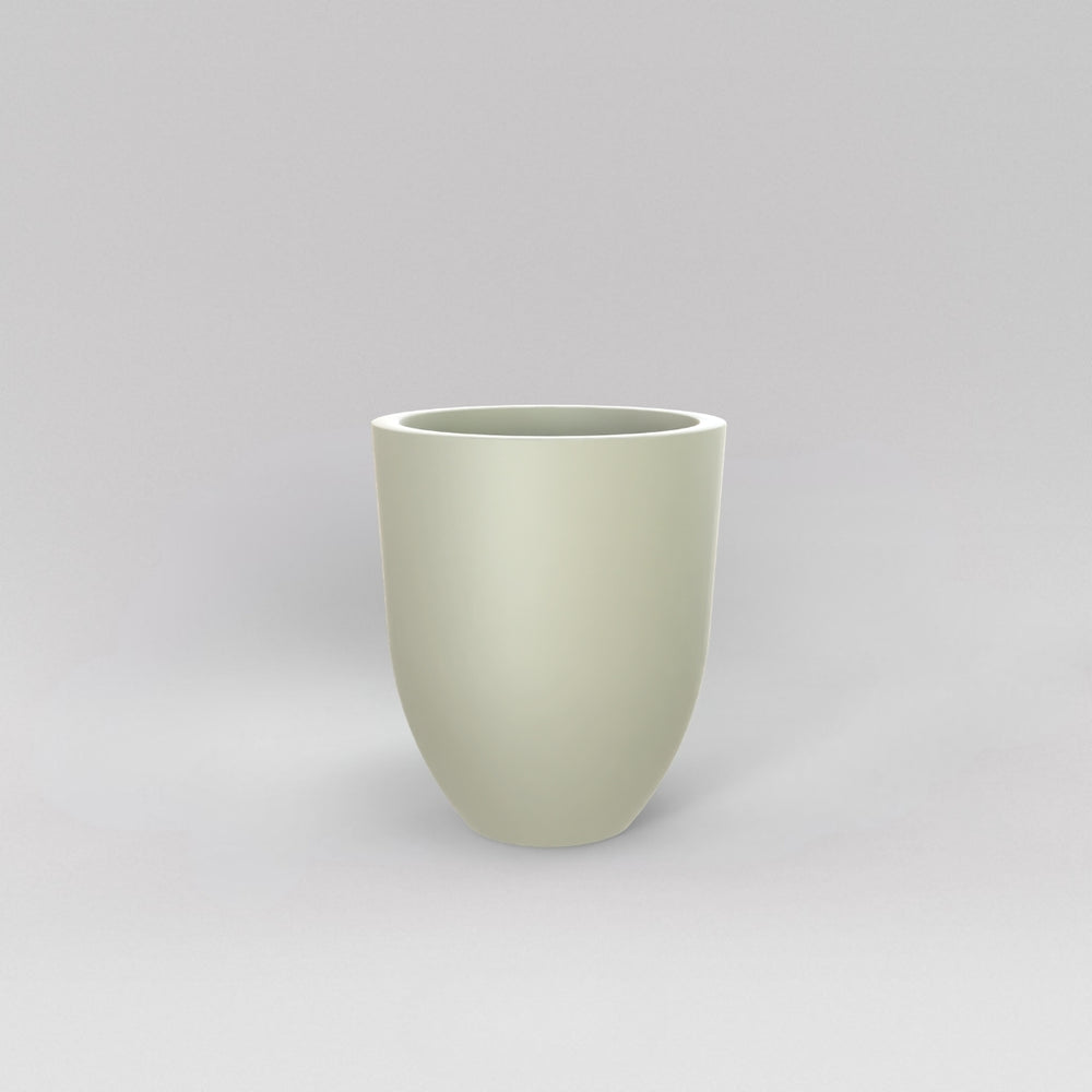 Valencia Tapered Round Fiberglass Planter in satin beige against gray background.