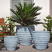Vari Planter Set of 3 in Marano Celeste on concrete in the backyard.